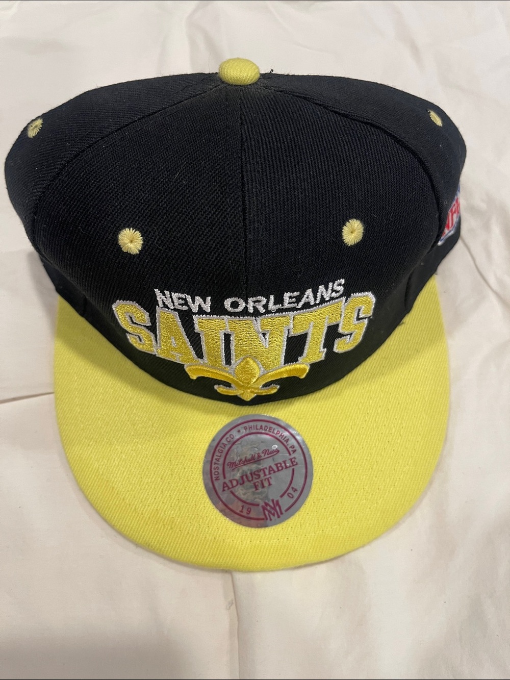 Mitchell & Ness Black and Yellow New Orleans Saints Embroidered Snapback New